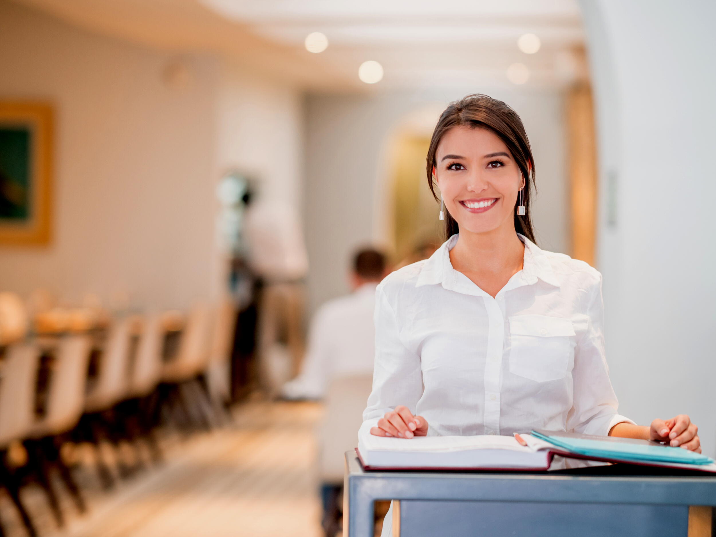 Woman working as hostess at a restaurant